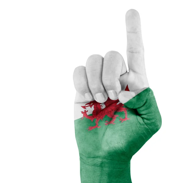 Wales Flag On Pointing Up Hand – stockfoto