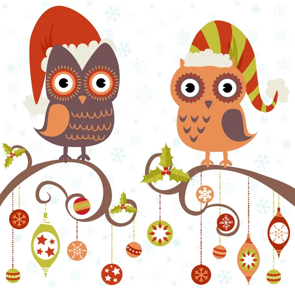 Christmas card of owls in hats sitting on a tree branch — Stock Vector