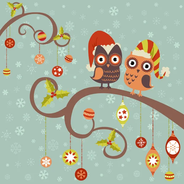 Christmas card of owls in hats sitting on a tree branch — Stock Vector