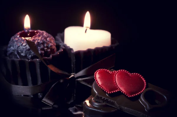 Romantische achtergrond met hartjes en kaarsen — Stockfoto