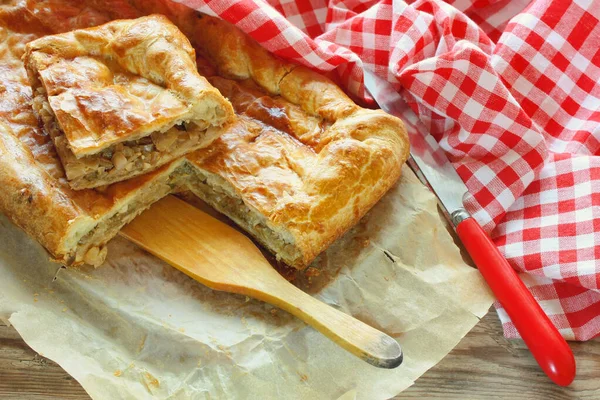 Traditional Homemade Pie Cabbage Portions Rustic Wooden Table Close Russian Rechtenvrije Stockfoto's