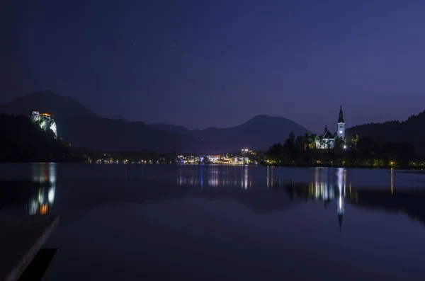 Vista noturna do lago Bled — Fotografia de Stock