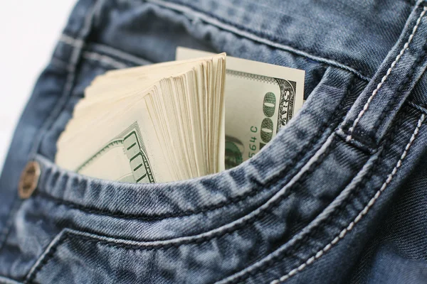 Dollar in de zak jeans — Stockfoto