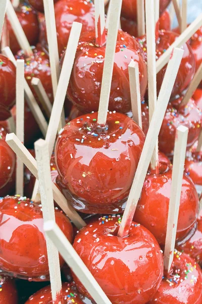 Red candied apples as background — Zdjęcie stockowe