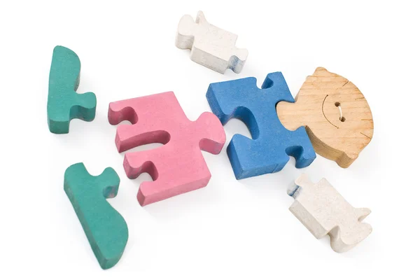 Colorful wooden boy puzzle pieces — Stock Photo, Image