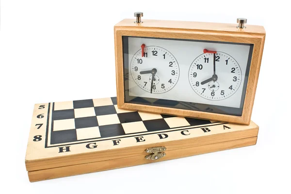 Chess clock on chessboard — Zdjęcie stockowe