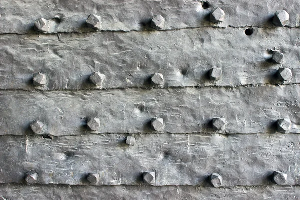 Textura da porta de ferro medieval como fundo — Fotografia de Stock