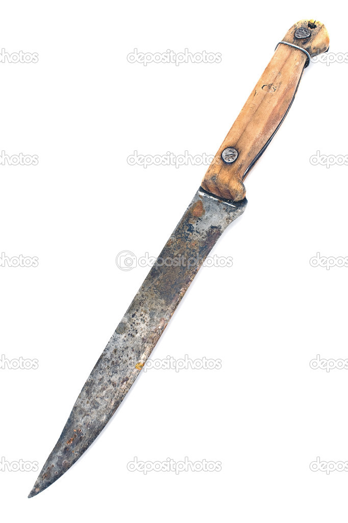 Old rusty knife with wooden handle
