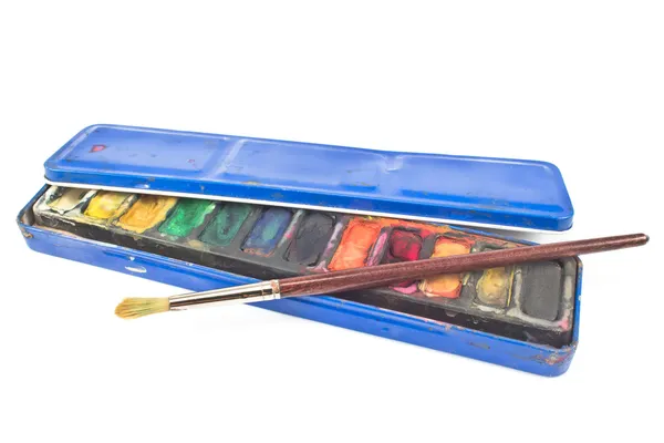 Watercolor paints in tin box and paintbrush isolated on white — Stock Photo, Image