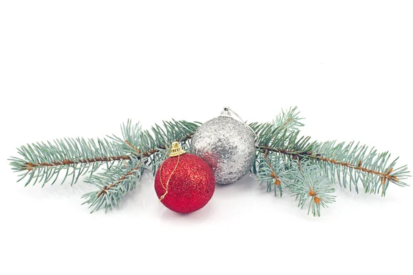 Christmas balls and pine needles isolated on white — Stock Photo, Image