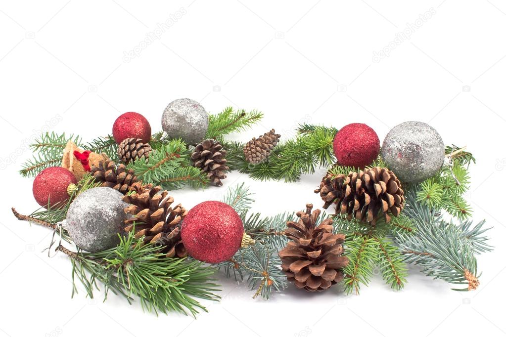 Pine cones, needles and Christmas balls on white background