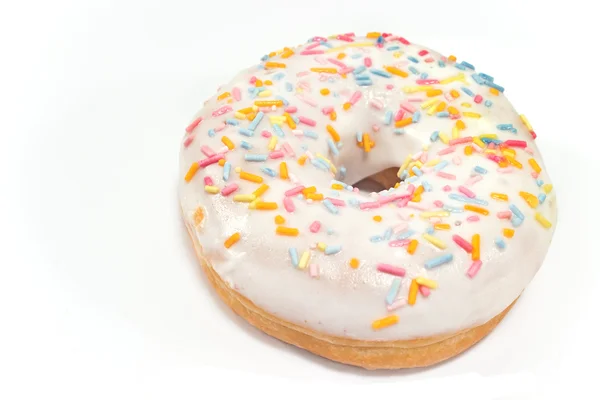 Donut med sprinklere isolert på hvitt – stockfoto