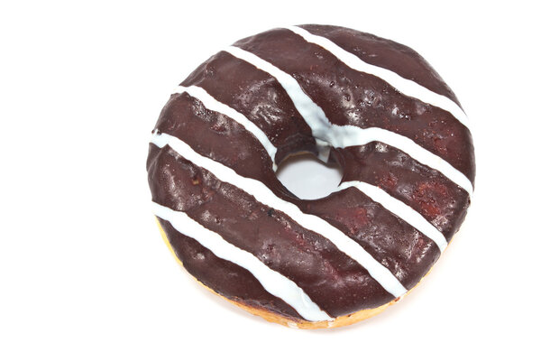 Donut in chocolate glaze with stripes isolated on white