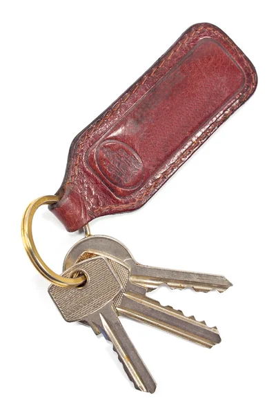 Keys with leather tag isolated on white — Stock Photo, Image