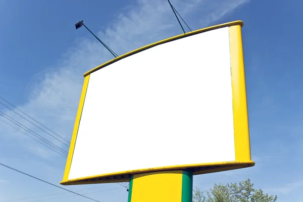 Blank yellow billboard over blue sky — Stockfoto