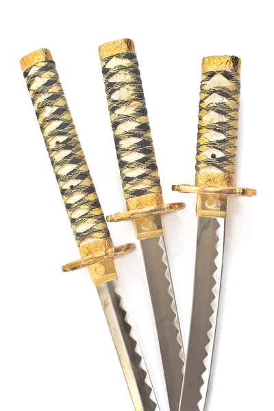 Tre japanska samurai katana svärd över vita — Stockfoto