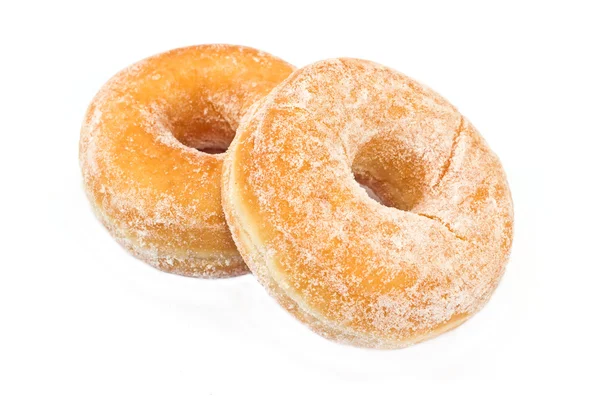 Два пончика, порошок с сахаром изолированы на белом — стоковое фото