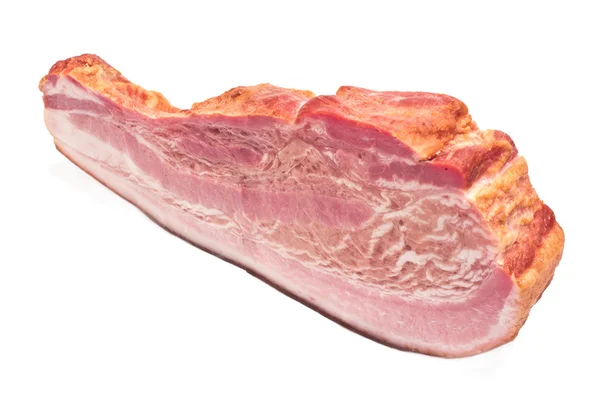 Pedaço de bacon fumado isolado em branco — Fotografia de Stock