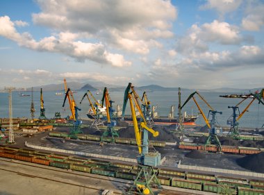 Coal loading on a vessel in port Nakhodka (Far East) clipart