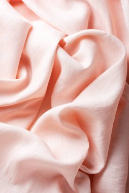 Pembe yaprak renginde dalgalı keten kumaş, seçici odak resmi