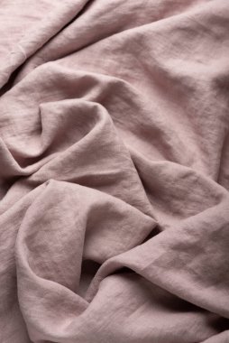 Leylak renginde taş yıkanmış keten kumaş, dikiş konsepti, seçici odak resmi