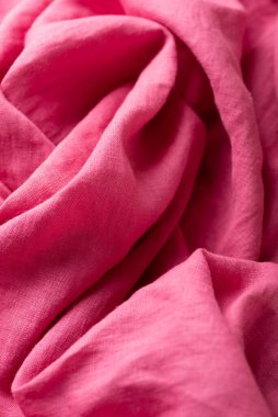 Pembe taşlanmış keten kumaş, dikiş konsepti, seçici odak resmi