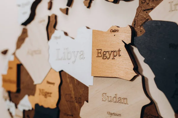 Africa continent on a wooden world map on a wall. Egypt, Libya countries