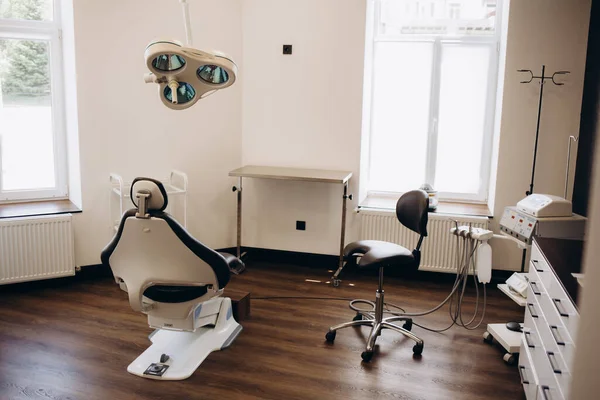 Dental ordination with blue dental chair and apparatus