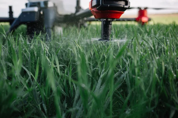 iot smart agriculture industry 4.0 concept, drone (in precision farm) use for spray a water, fertilizer or chemical to the field, farm for growth a yields,crops, use for control, kill the bug or weed