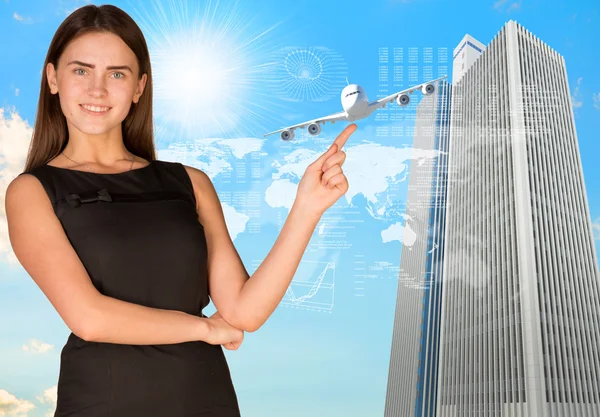 Businesswoman pointing her finger in direction