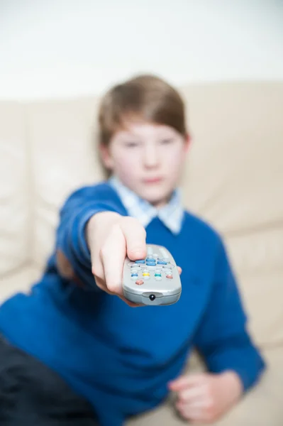 Boy with a Television Remote — Stock Photo, Image