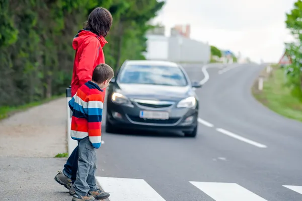 Car stopped for pedestrian Royalty Free Stock Images