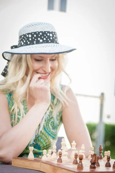 Thinking Woman in a Chess Game — Stock Photo, Image