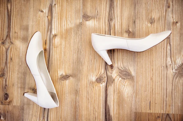 Biały kobiece buty — Zdjęcie stockowe