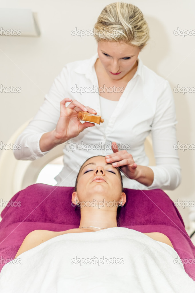 Massage oil on the forehead