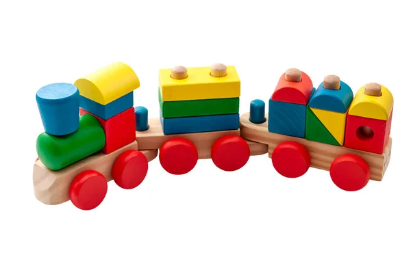 Vintage toy train model made of blocks in many shapes isolated on white background with a clipping path cutout concept for childhood development, minimalist nostalgic toys and educational play time