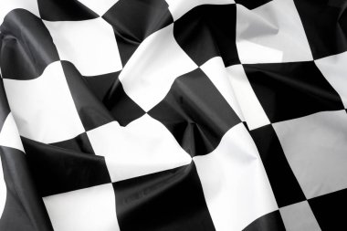 Full frame close up image of waving victory check flag concept for win the race, winning at the finish line and racing backgrounds