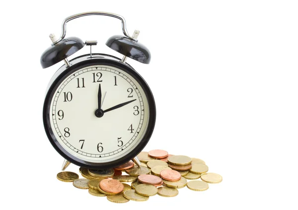 Reloj despertador y monedas — Foto de Stock