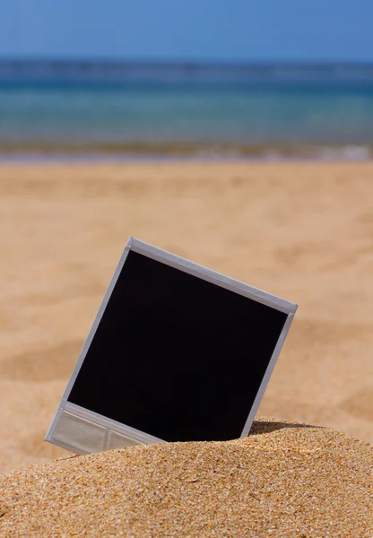Instant photo on a beach — Stock Photo, Image