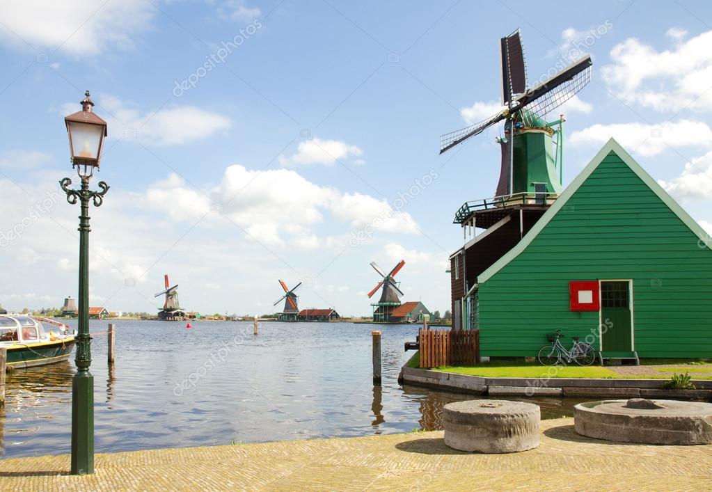 Dutch windmills over river in Zaanse Schans