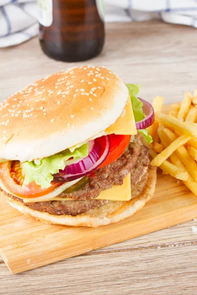 Big hamburger with beer — Stock Photo, Image