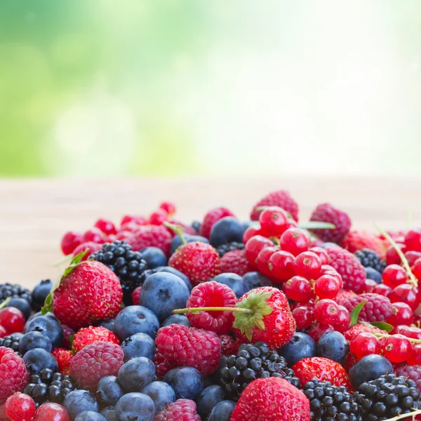 Ripe  of  berries on table — Stock Photo, Image