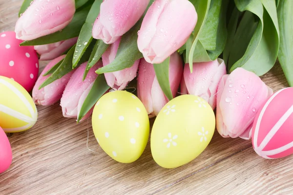 Bouquet of pink tulips with eggs — Stock Photo, Image