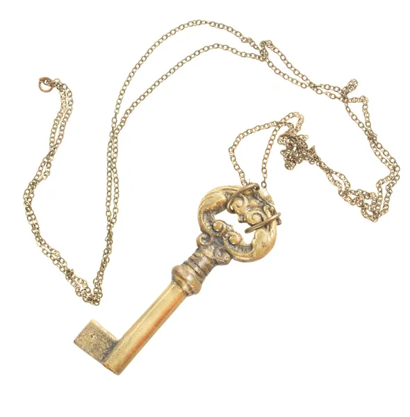 Antique golden skeleton key — Stock Photo, Image
