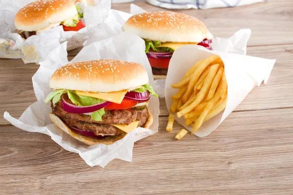 Fresh hamburgers with french fries — Stock Photo, Image