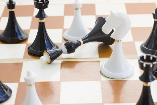 Checkmate white defeats black  king — Stock Photo, Image