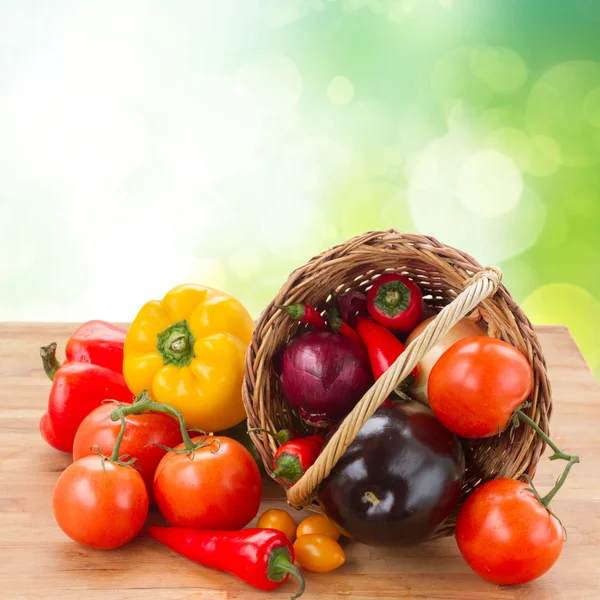 Raw  vegetables in wicker basket — Stock Photo, Image