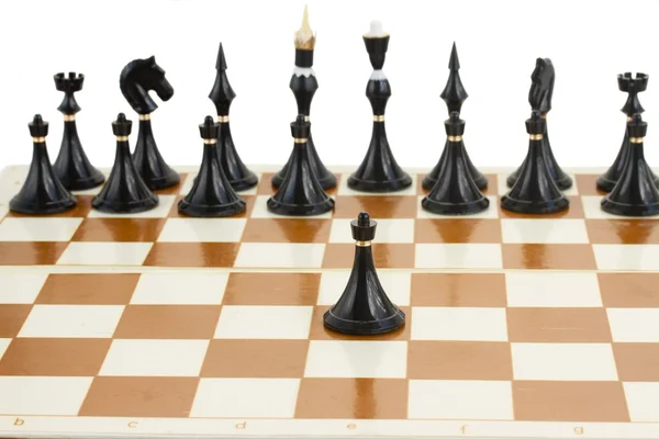 Black pawn in front of black chess — Stock Photo, Image