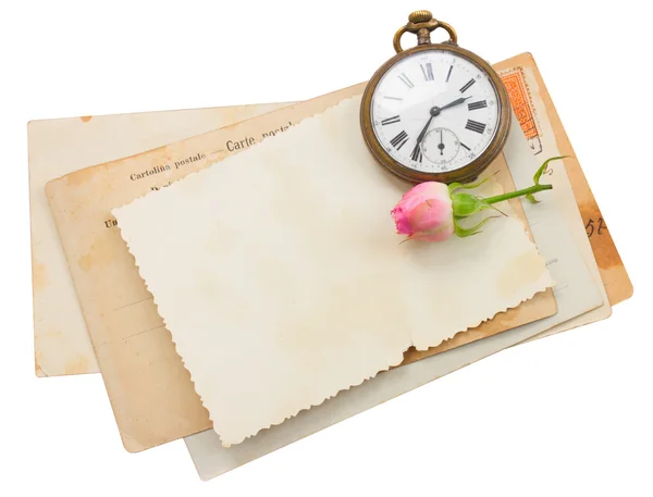 Tas de vieux papiers avec horloge antique — Photo