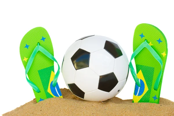 Football ball in sand — Stock Photo, Image